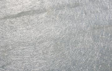 Nedging Tye laminate fibreglass or shingles?